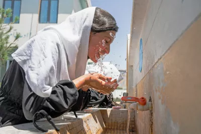 On 13th June 2022, a student washes her hands and face at the UNICEF-supported Fatah Girls School in Herat, Afghanistan.