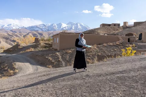 On 31 October 2023, Fatima Sadaat, Community Health Worker in Bamyan Province, Afghanistan, walks through a community to meet a family in need of healthcare.