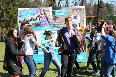 Adolescents and youth are dancing on the field in Sofia, Bulgaria, participating in UNICEF organized event. 