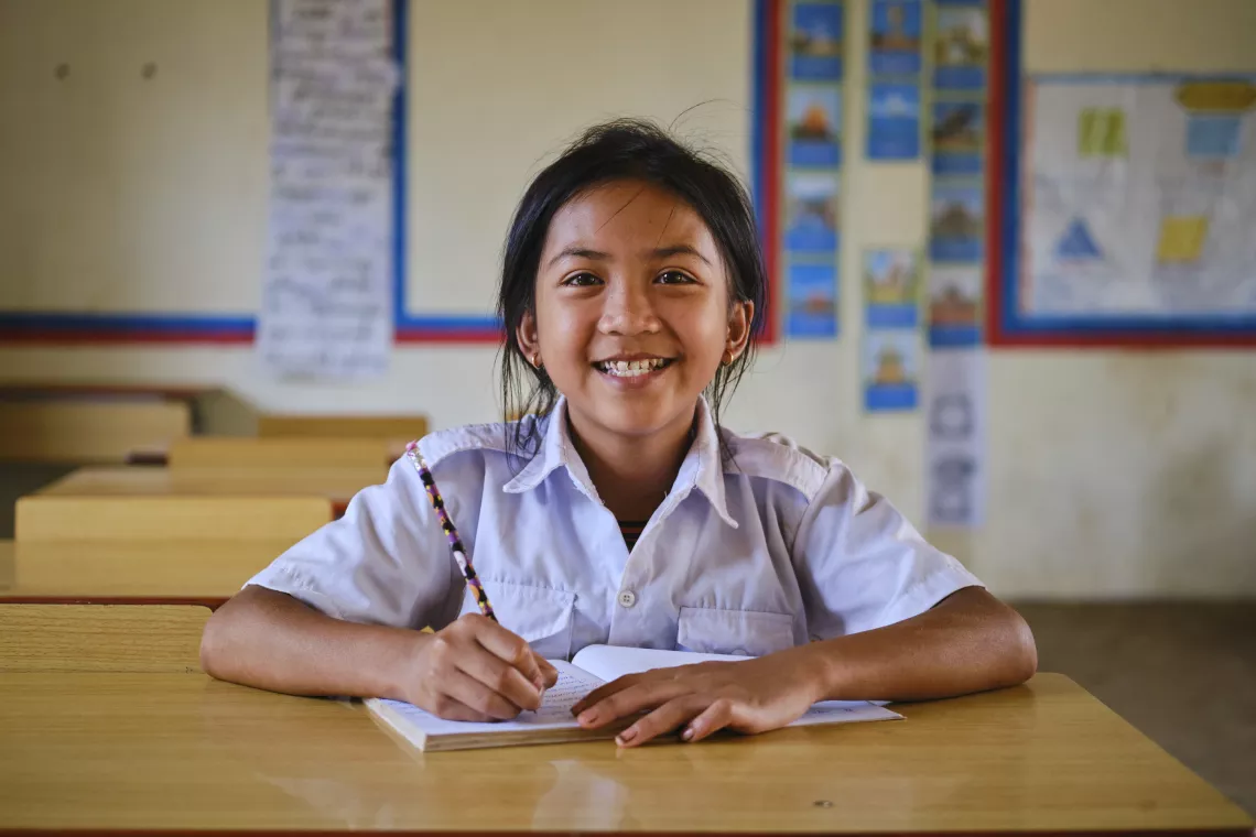 13-year-old Koun Chanthom saw a big improvement in her health when her family used a latrine at home, helping her attend school more regularly and focus on her studies 