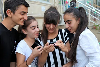 Students, some with disabilities, participate in a UNICEF photography workshop in Azerbaijan