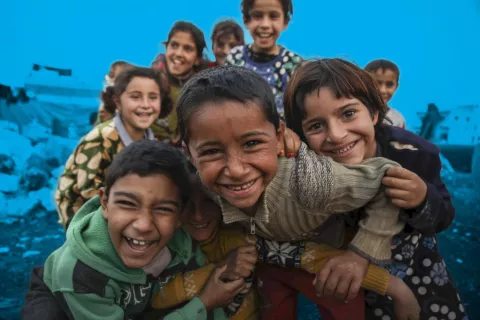 A group of children smiling