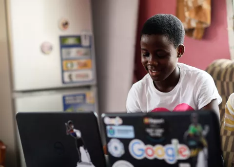  Winifred Asantewaa Asante, 15, is a first year student studying Clothing and Textiles at Ghana Senior High School, Efiduase, Koforidua using a laptop.