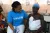 UNICEF staff member with a beneficiary.