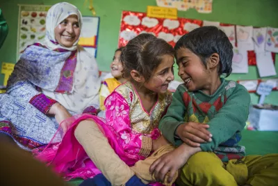 Tahera Yusuf, an Aanganwadi worker conducts a session on Early Childhood Education (ECE) while children react during an activity at the Aanganwadi centre in Arizal, Jammu & Kashmir.