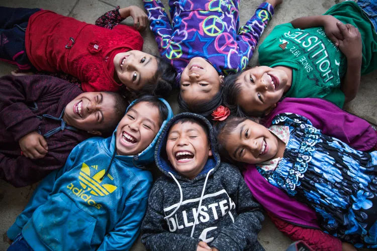 You nearly hear the laugh of these children of the indigenous community of Chicoy of Todos Santos Cuchumatánin in the province of Huehuetenango, Guatemala on October 16, 2019 as they enjoy their last day of school.