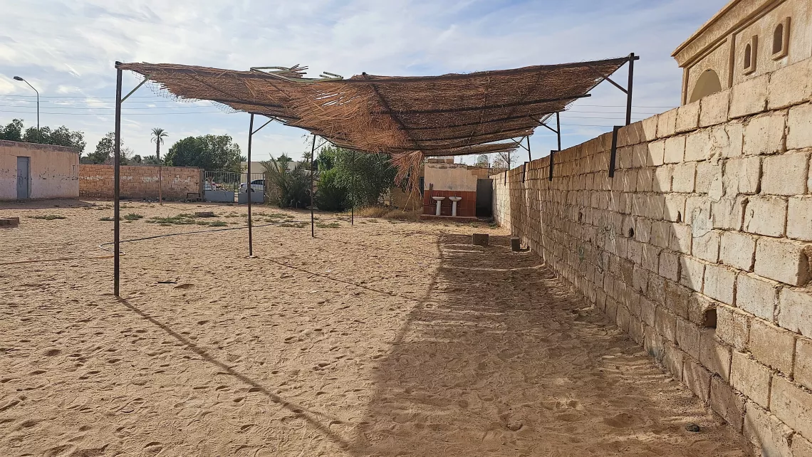 On the left, Pictured the old Taqrouteen Schoolyard, with poor restrooms open to the outdoors, reflects the pressing need for infrastructure development. On the right, the new restrooms after UNICEF intervention.