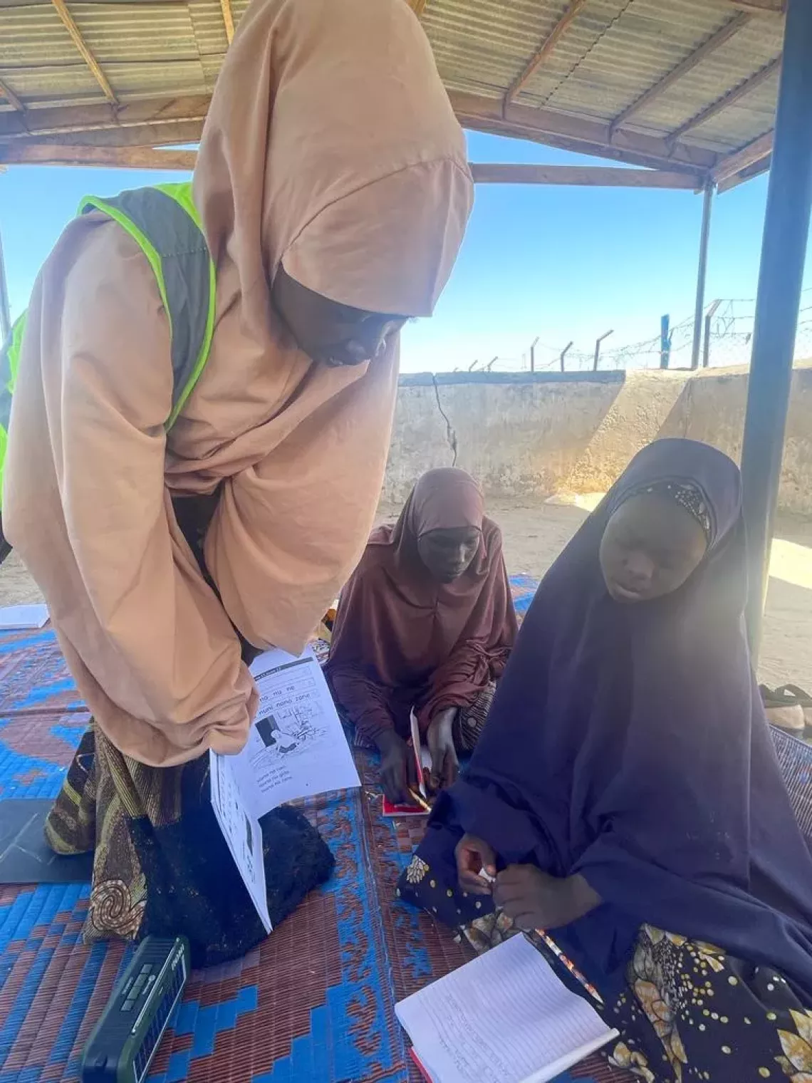 Fauziyya Mohammed teaches out-of-school children in north-east Nigeria