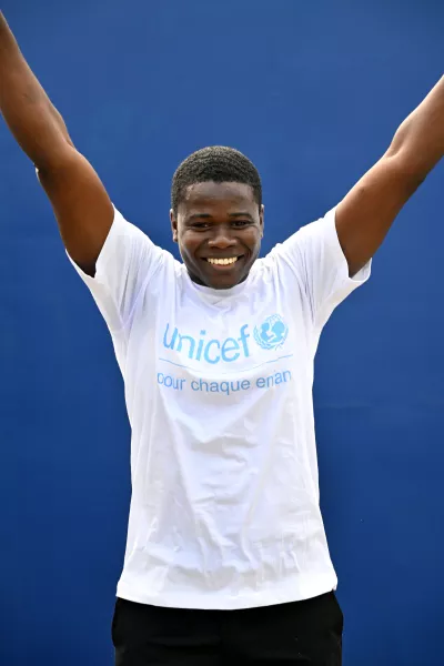 young boy with a UNICEF t-shirt.