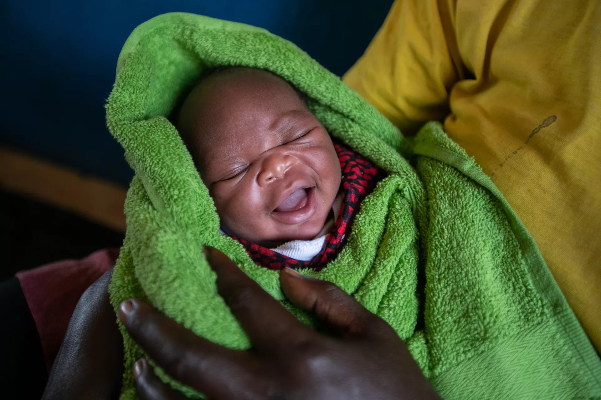 A mother and her new born baby at Karenga H/C IV, Uganda.