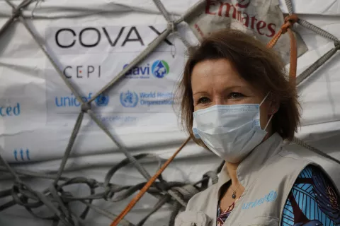On 24 February 2021, UNICEF Representative in Ghana Anne-Claire Dufay is photographed at the arrival of the first shipment of COVID-19 vaccines distributed by the COVAX Facility at Kotoka International Airport in Accra, Ghana's capital.