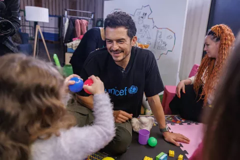 UNICEF Goodwill Ambassador Orlando Bloom plays with children in the UNICEF Spilno Child Spot at a metro station in Kyiv, Ukraine on 25 March 2023.