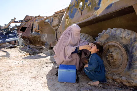 Afghanistan. A child receives a vaccination.