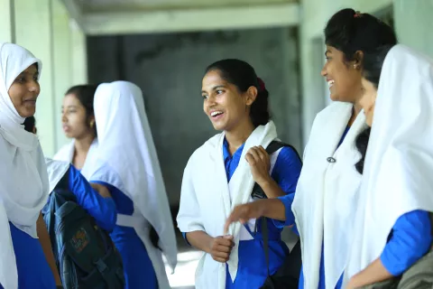 Fifteen-year-old Shampa, center, attends school with her classmates at Palli Mangal Girls High School, Gobor Chaka, Khulna City Corporation, in Bangladesh.