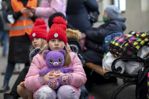 On 5 March 2022, amidst the escalating conflict in Ukraine, children at the Lviv-Holovnyi railway station in Lviv, western Ukraine, wait to board an evacuation train to Przemysl, Poland.
