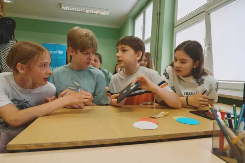 Refugee children from Ukraine are engaged in learning alongside Polish students.