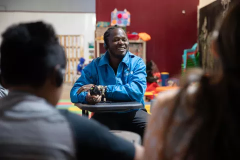 On 25 May 2023, UNICEF Goodwill Ambassador Ishmael Beah speaks with children while visiting a shelter for internally displaced families in Tijuana, Mexico.
