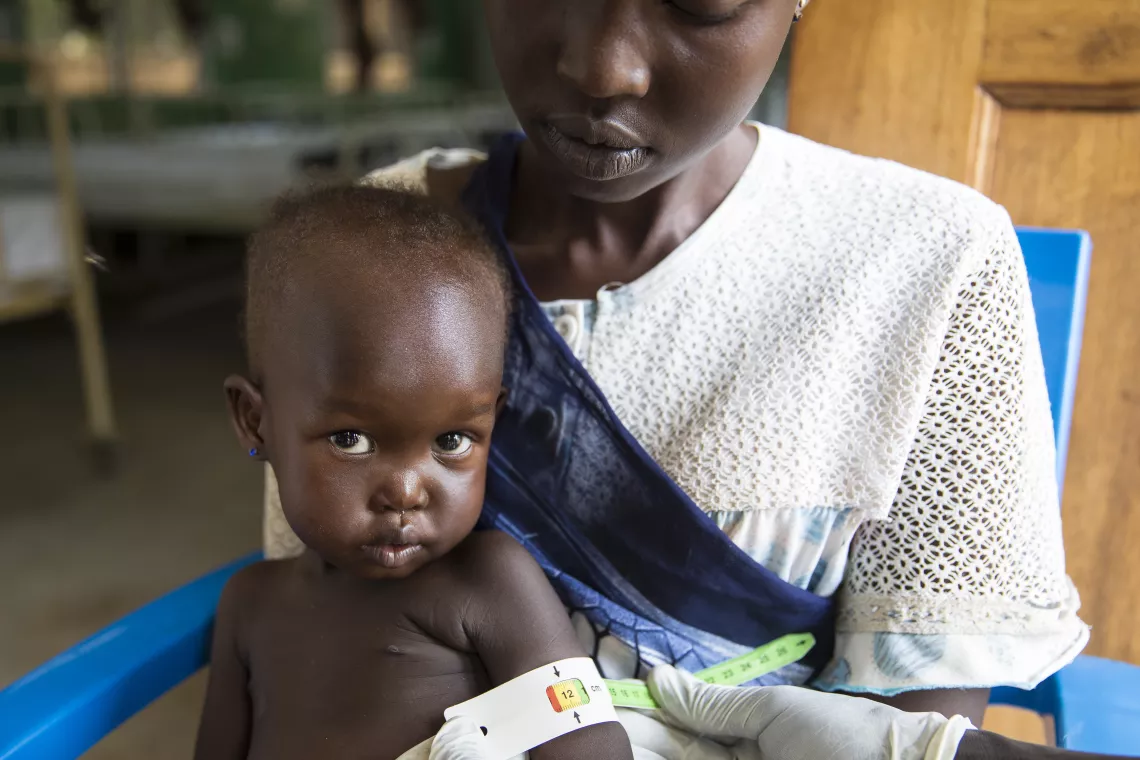 A child in Juba, South Sudan, is checked for malnourishment.