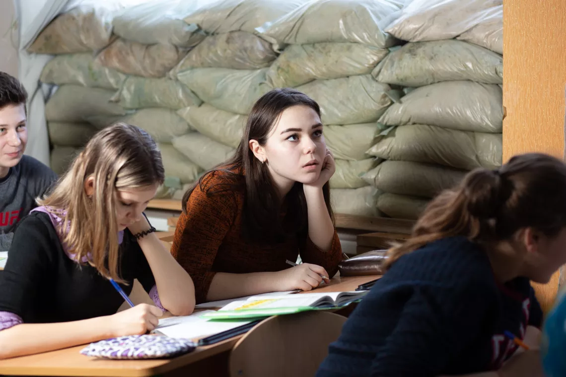 Ukraine. A girl studies in a classroom in eastern Ukraine.