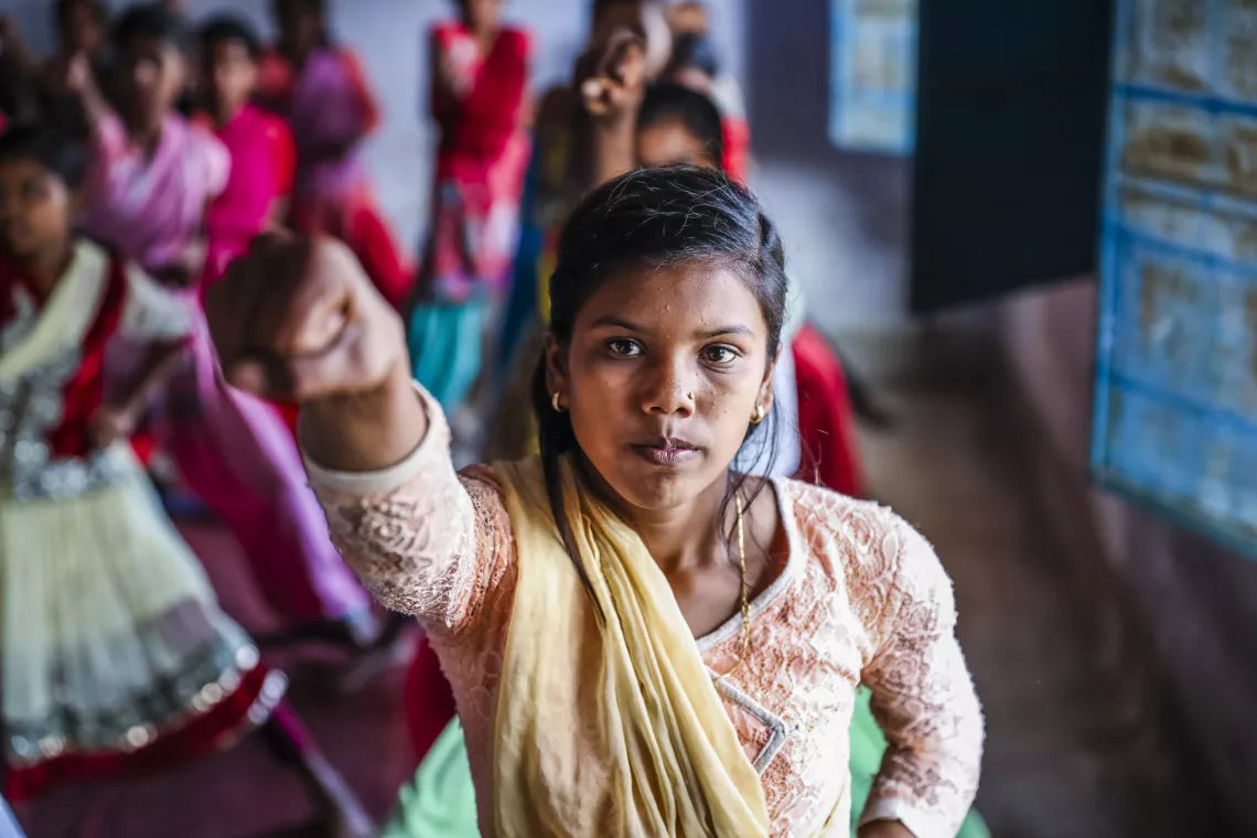 An adolescent girl practices karate in India, in 2017.