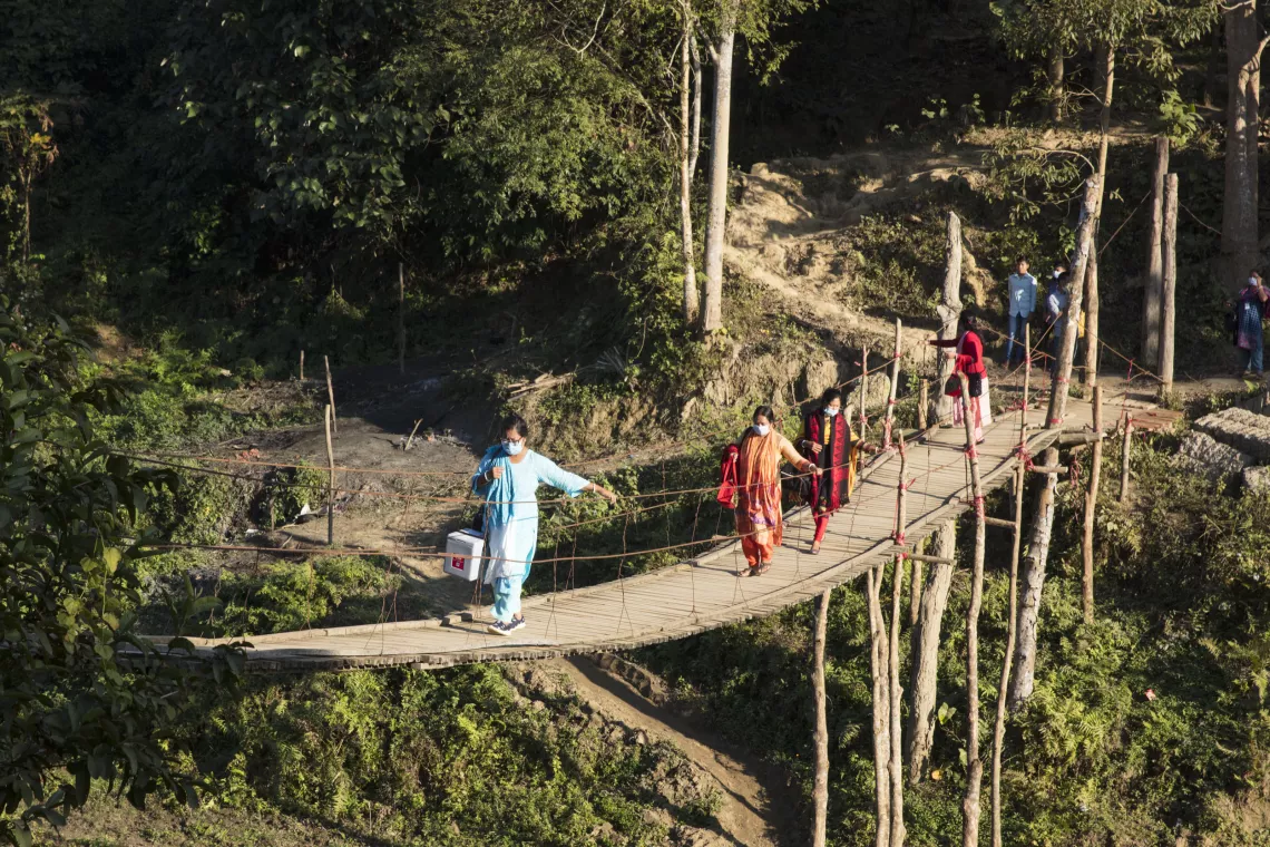 Health workers travel across the Chittagong Hill Tracts to deliver COVID-19 vaccines. This region in southern Bangladesh includes some of the most hard-to-reach communities in the country. 