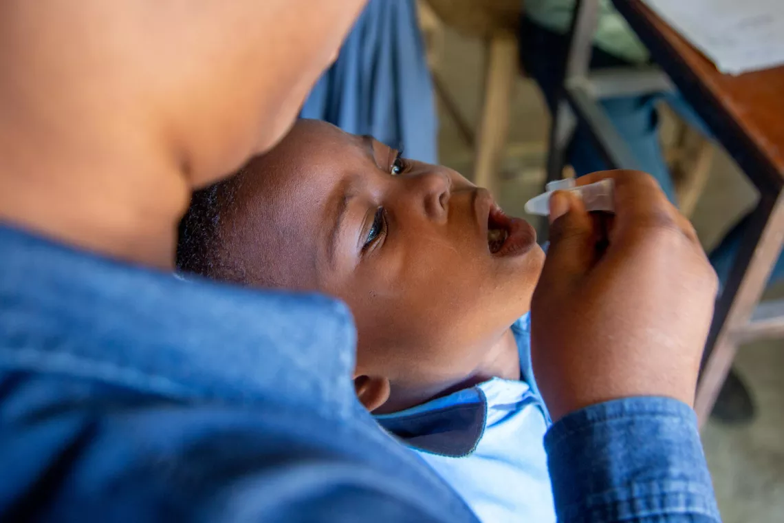 Haiti. A child receives a vaccine as part of a cholera vaccination campaign carried out in Mirebalais.