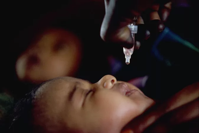 Vaccination in Sudan: a child gets a polio vaccine