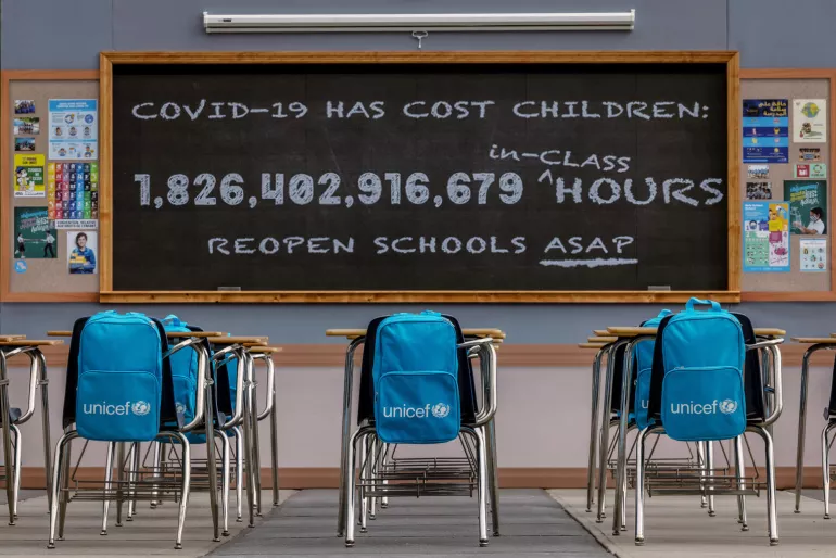 UNICEF classroom installation with a blackboard.