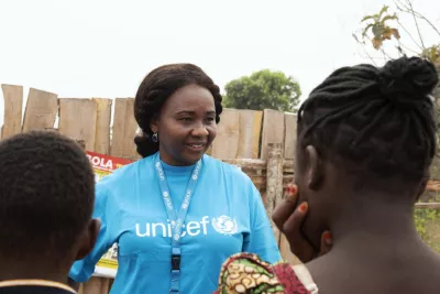UNICEF Child protection officer Anna Hadjixiros is giving an orientation to children who have turned up for the release