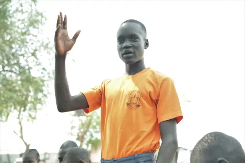 A UNICEF young reporter in Bor, Jonglei, reciting a poem for peace