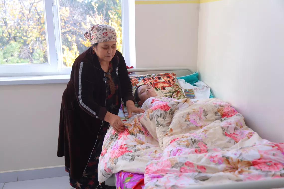 A mother with her son on the children's ward