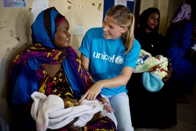 Sabine Brandenburg from UNICEF, talks to a mother in the Mwembeladu Maternity Home in Zanzibar , Tanzania