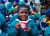 A five-year-old child holding a cup of porridge provided to children who attended the stunting campaign launch in Njombe Region. 