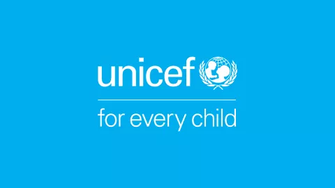 White UNICEF logo on a cyan background