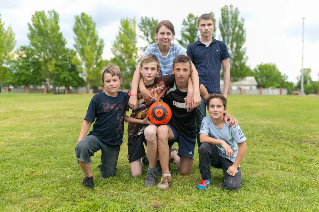 Children who play football together on the outskirts of Donetsk are all of different ages and from different grades. They met and became friends at the football field near their school No.71. "Dima just came to me and said "let's be friends" And since then, we play together," says Dima Silchenko, 12 years old.