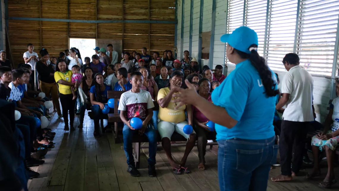 Nardi Torres, Accountability Technician to Affected Populations during an awareness-raising with parents of the community about water, hygiene and sanitation and the importance of safe water at San Francisco de Guayo in Delta Amacuro state on March 21, 2023.