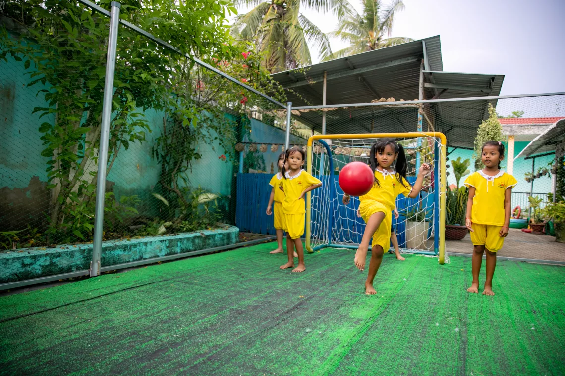 Thach Thi Hong Mo, 5 years old, Khmer girl enjoys playing football with her friends at Long Phu Preschool, Long Phu District, Soc Trang Province, Viet Nam. Her preschool is supported by UNICEF’s early childhood education programme.