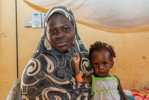A mother and her child in a health centre