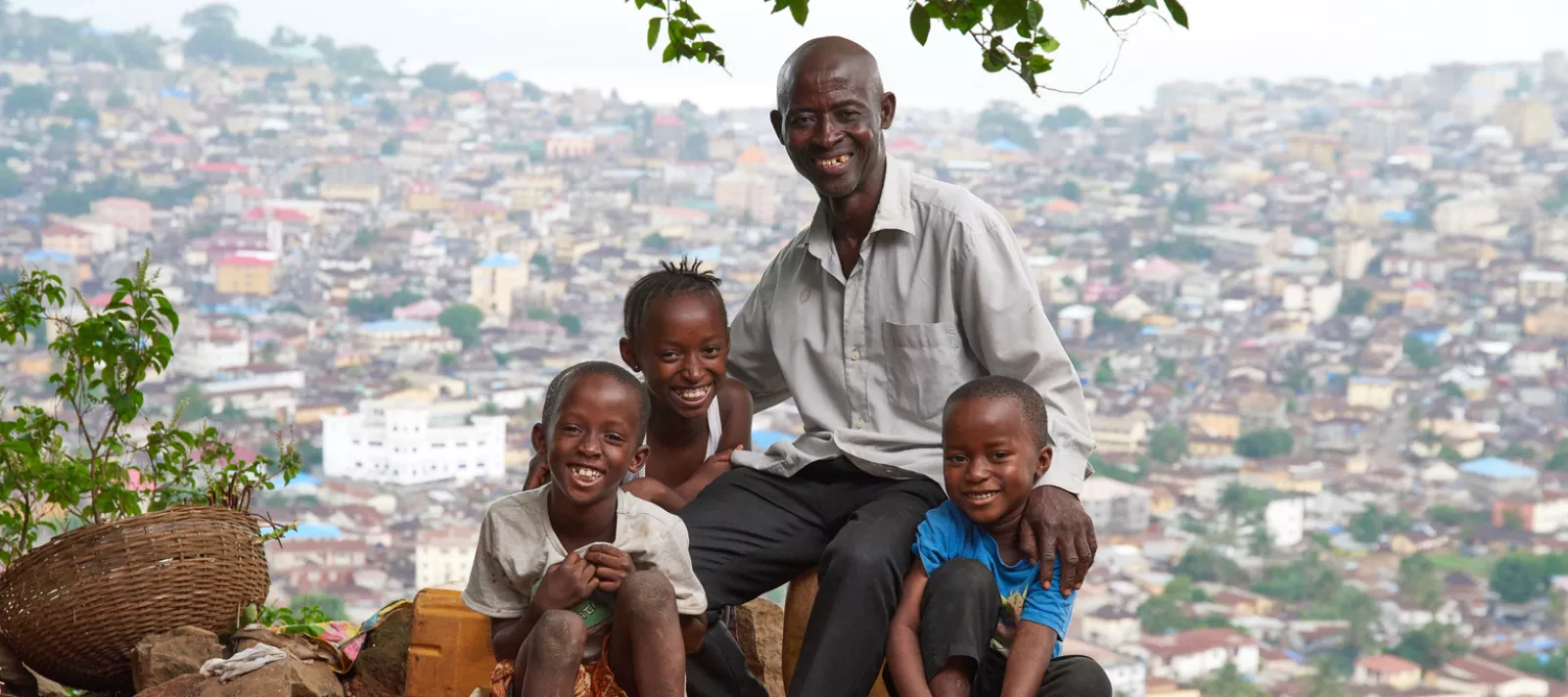 Sulaiman Samura with three of his children, from left, Fatmata, 10 years old, Kabba, 7 years old and Jonathan, 5 years old in the the suburb of Hilltop, Freetown, Sierra Leone on May 30, 2017. 