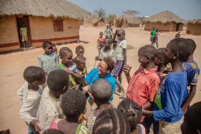 UNICEF Representative interacting with children in Chilele Village, Luapula Province, Zambia 