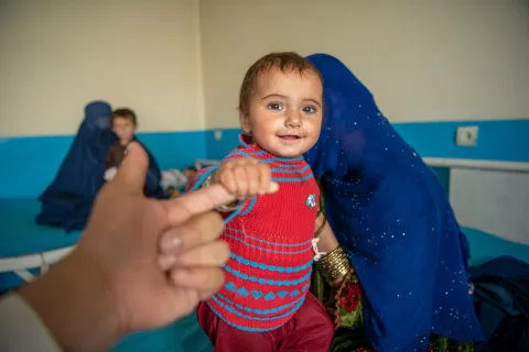 On 9 July 2023, 10-month-old Adela is photographed in the inpatient ward of Wardak Provincial Hospital with her mother, Basmina. Adela has just recovered from a severe case of acute watery diarrhoea.