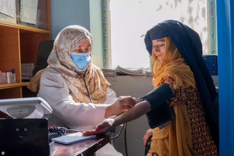 On 7th November 2023, Shazia Shayaan 33 years old is a midwife is checking the patient's blood pressure at Laayaba Basic Health Center in Laayaba village, Fayzabad district, Badakhshan province, Afghanistan.
