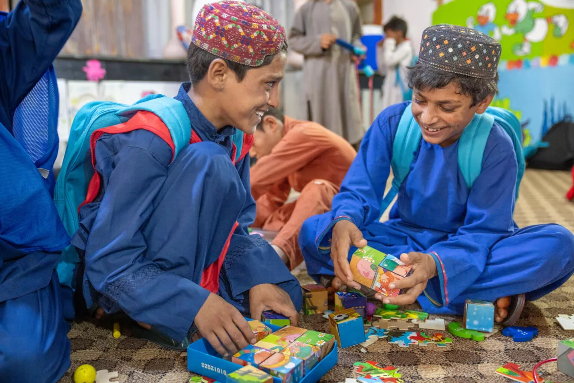 On 8 August 2023, at a UNICEF supported transitional center in Mazar, northern Afghanistan, boys play inside a child friendly space