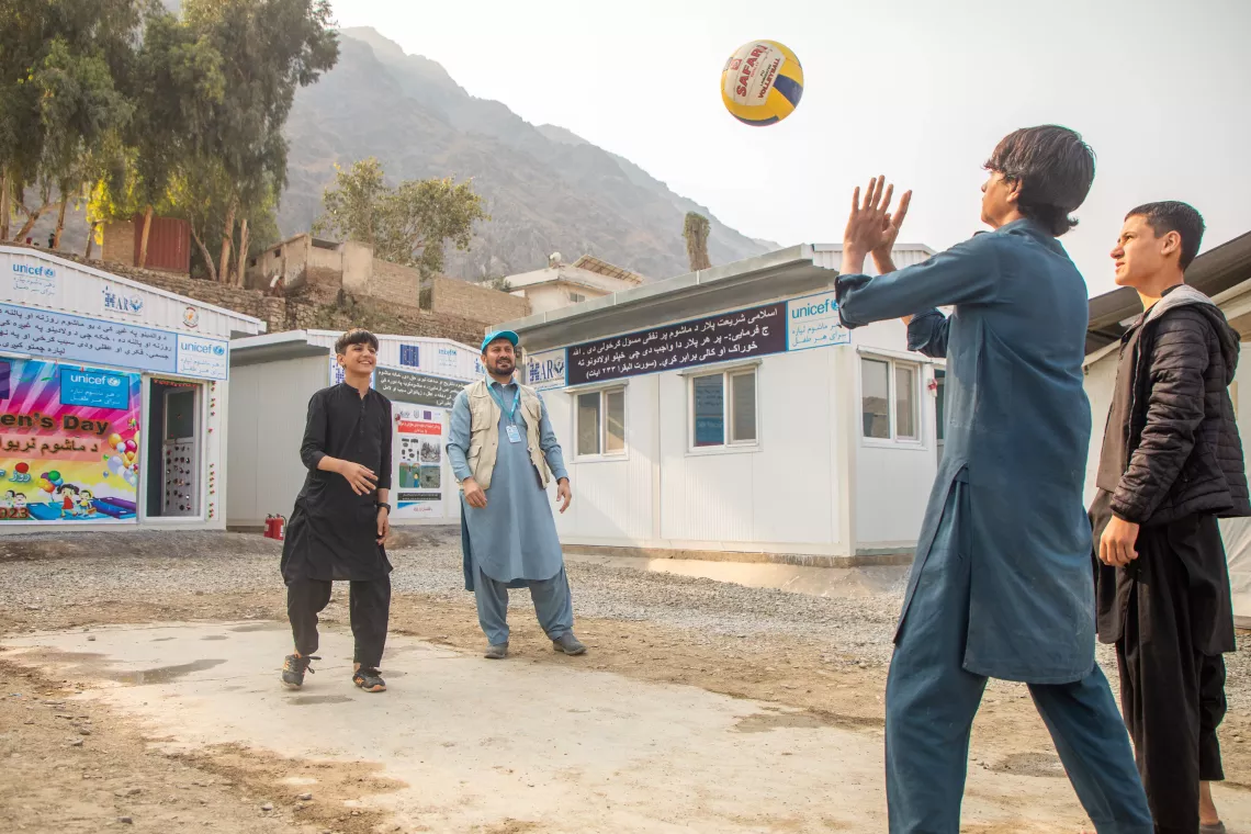 In December 2023, in Nangarhar Province, Afghanistan, at the Torkham border, Matiullah, left, met other boys like him at the UNICEF Drop-In Centre, who had also been separated from their families while trying to migrate. 
