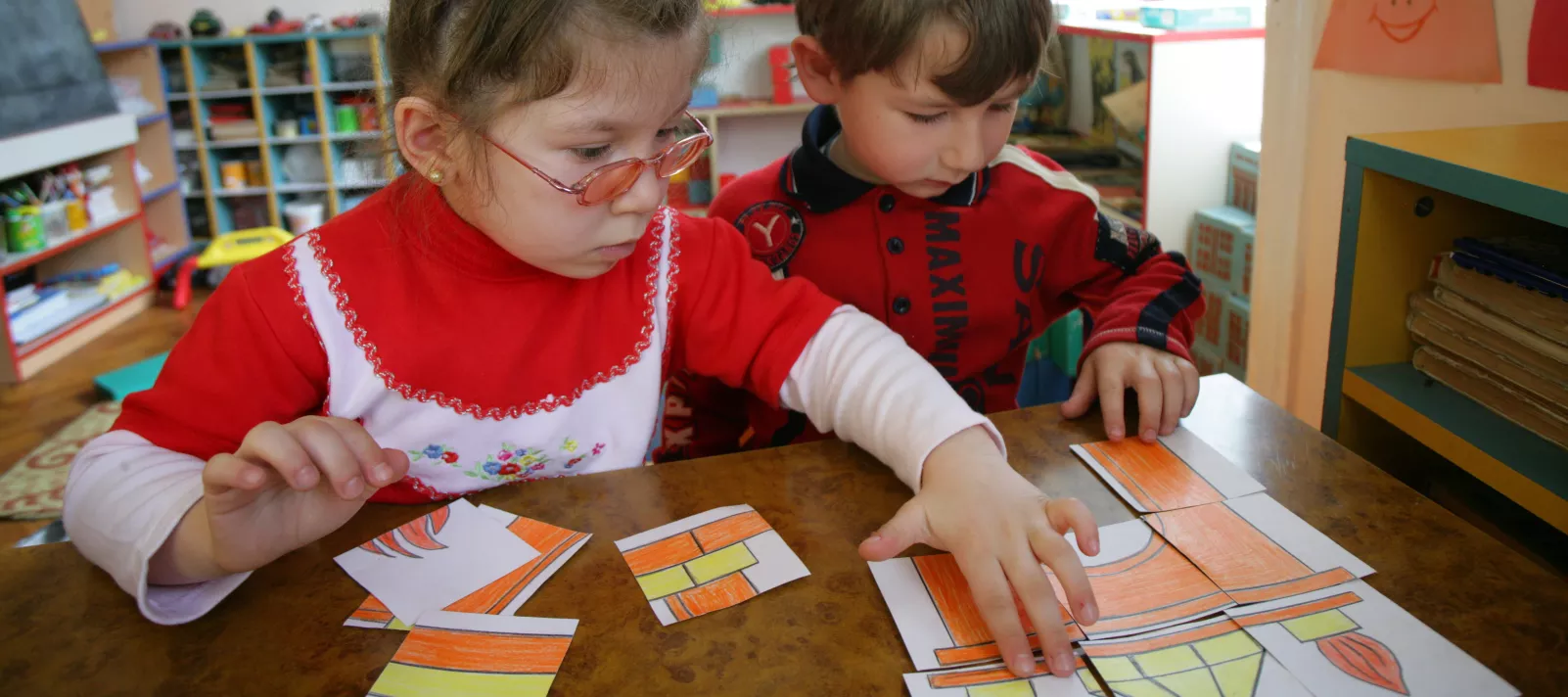 Children do a puzzle at an early childhood development centre in Baku.