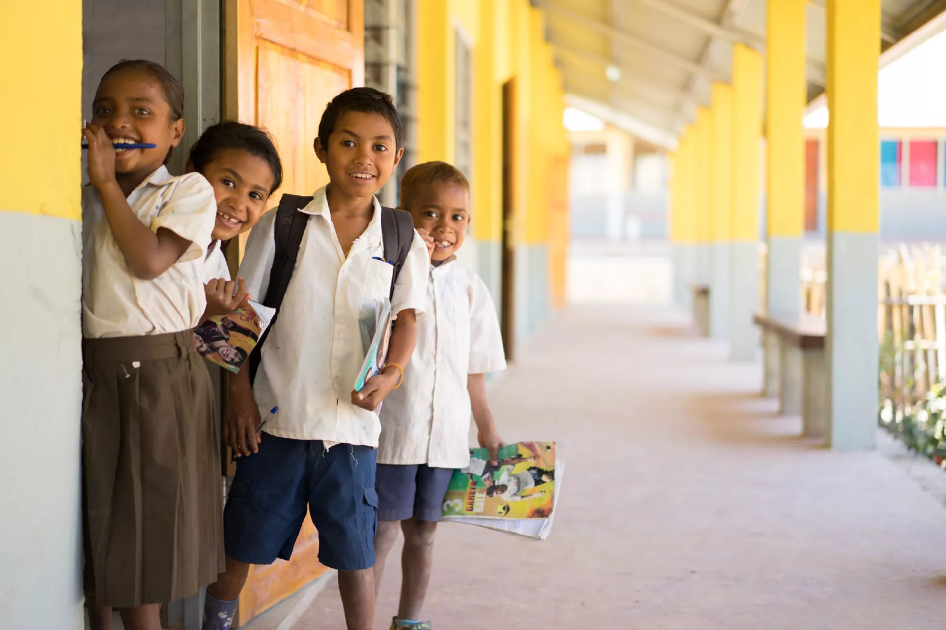Children outside their UNICEF-supported school in Timor-Leste