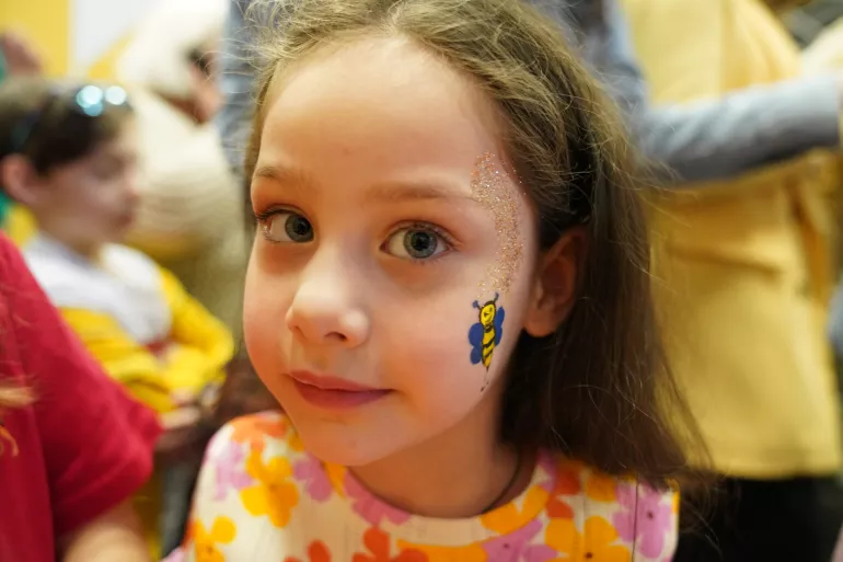 Child with a face painting