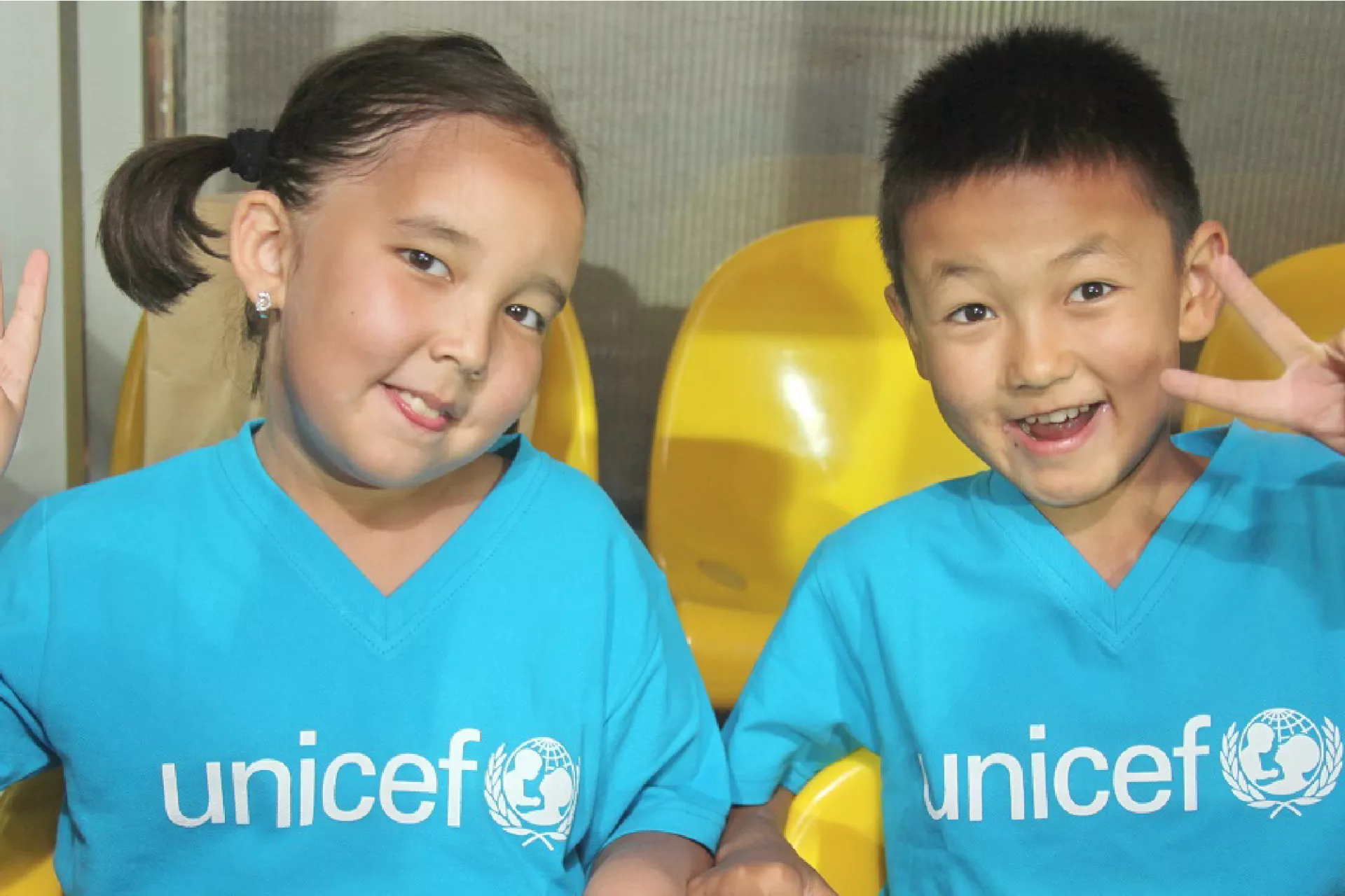 children in UNICEF t-shirts