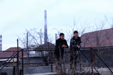 children next to Bishkek heating plant 