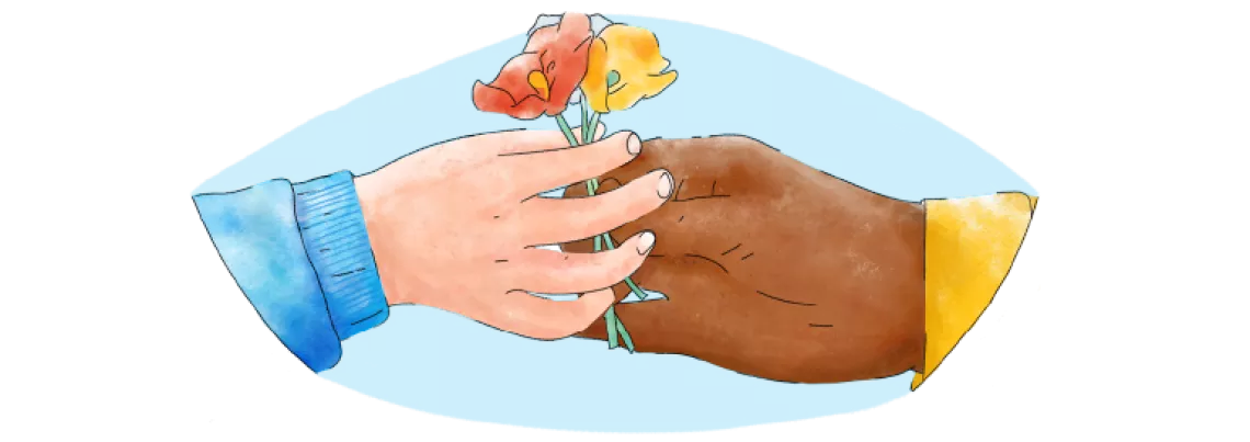 Dos manos sostienen flores